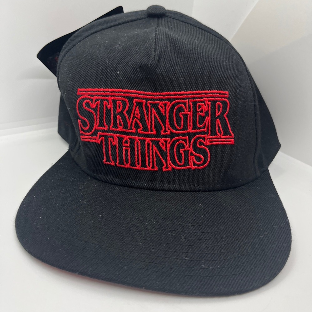 Stranger Things SnapBack hat. Picture of characters on underside of bill